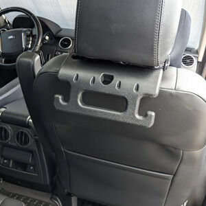 Car headrest handle accessory, holds shopping bags, purse, grab bar